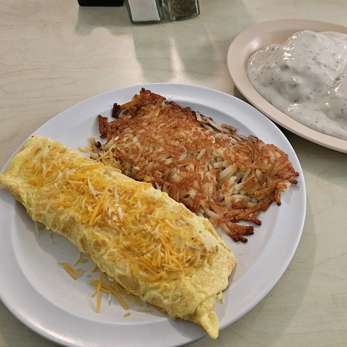 Bacon Tomato and Cheese Omelette with Hash Browns