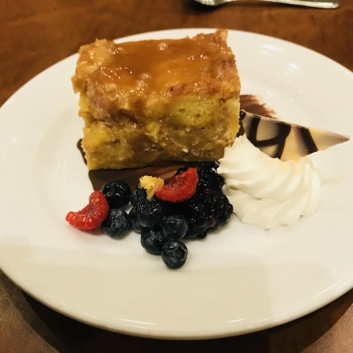 Glazed Bread Pudding with Crème Anglaise and Fresh Berries