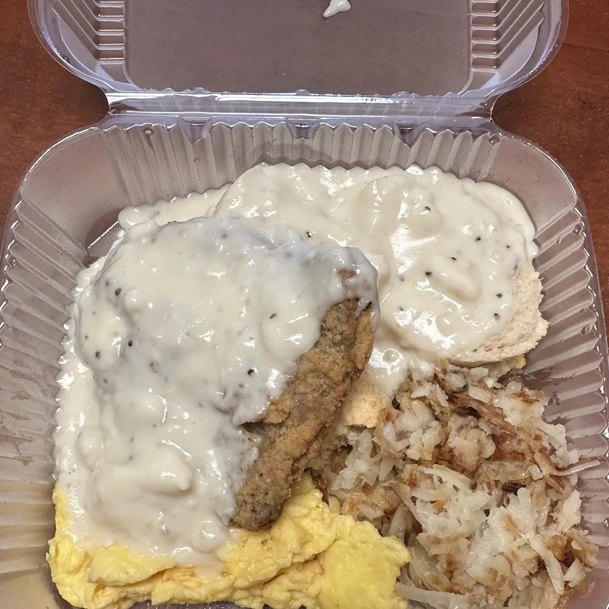 Country Fried Steak with Eggs Hash and Biscuits & Gravy