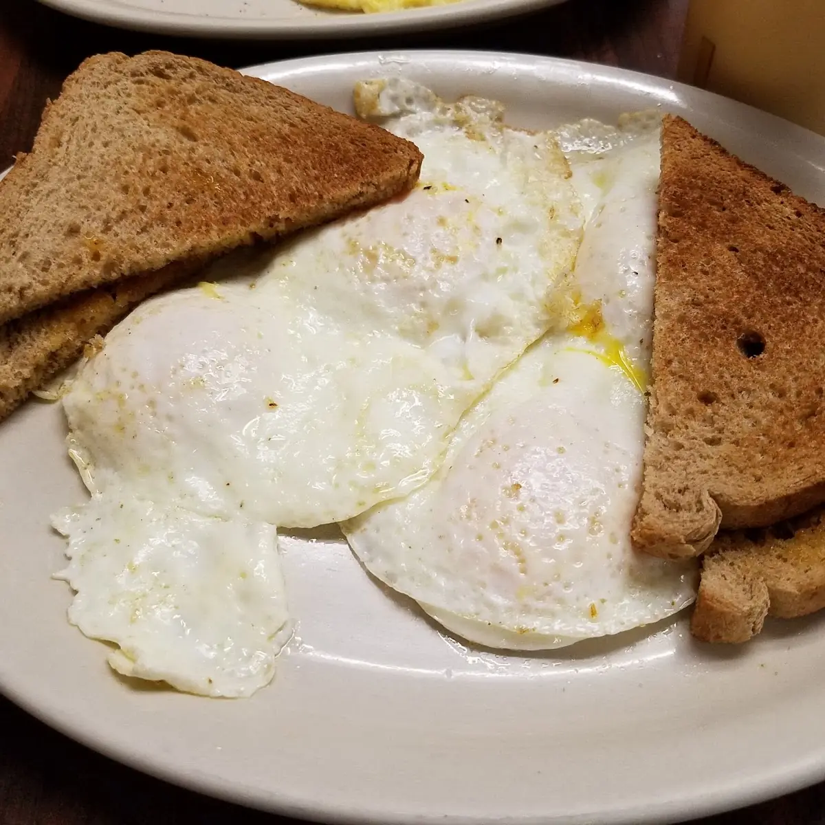 4 Eggs over Easy with Whole Wheat Toast