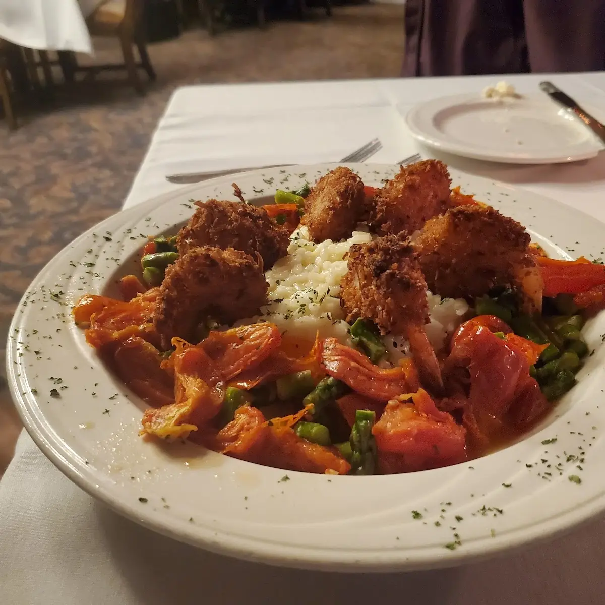 Coconut Shrimp on Vegetable Rice with Chopped Asparagus and Tomatoes