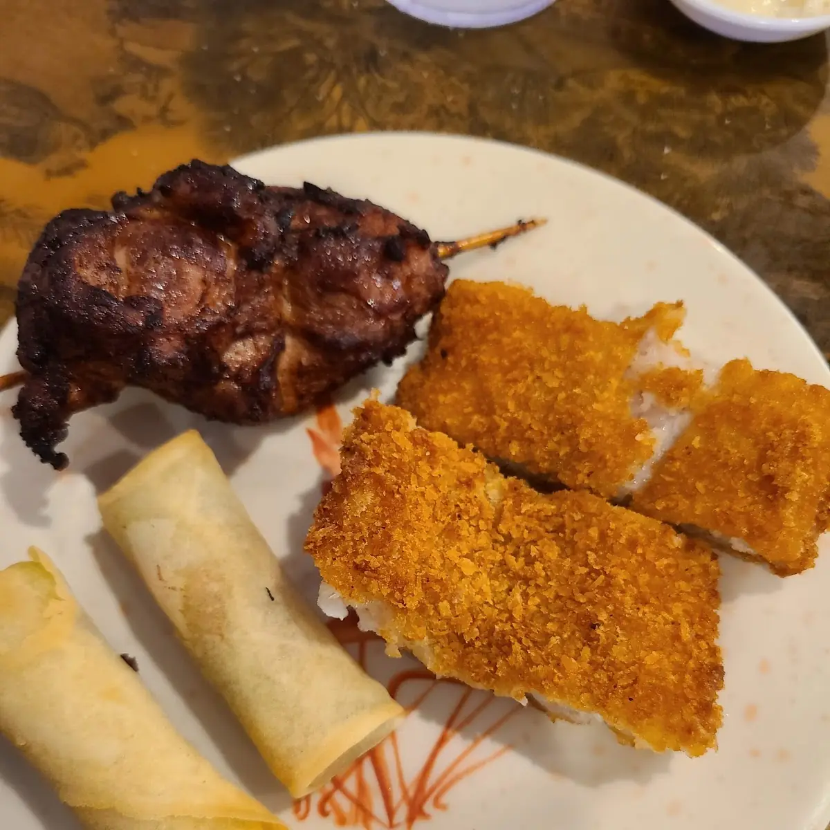 Chicken on a Stick Fried Fish and Spring Rolls