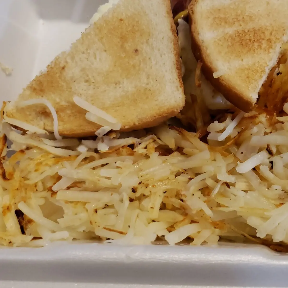 Bacon Egg and Cheese Sandwich and Hash Browns