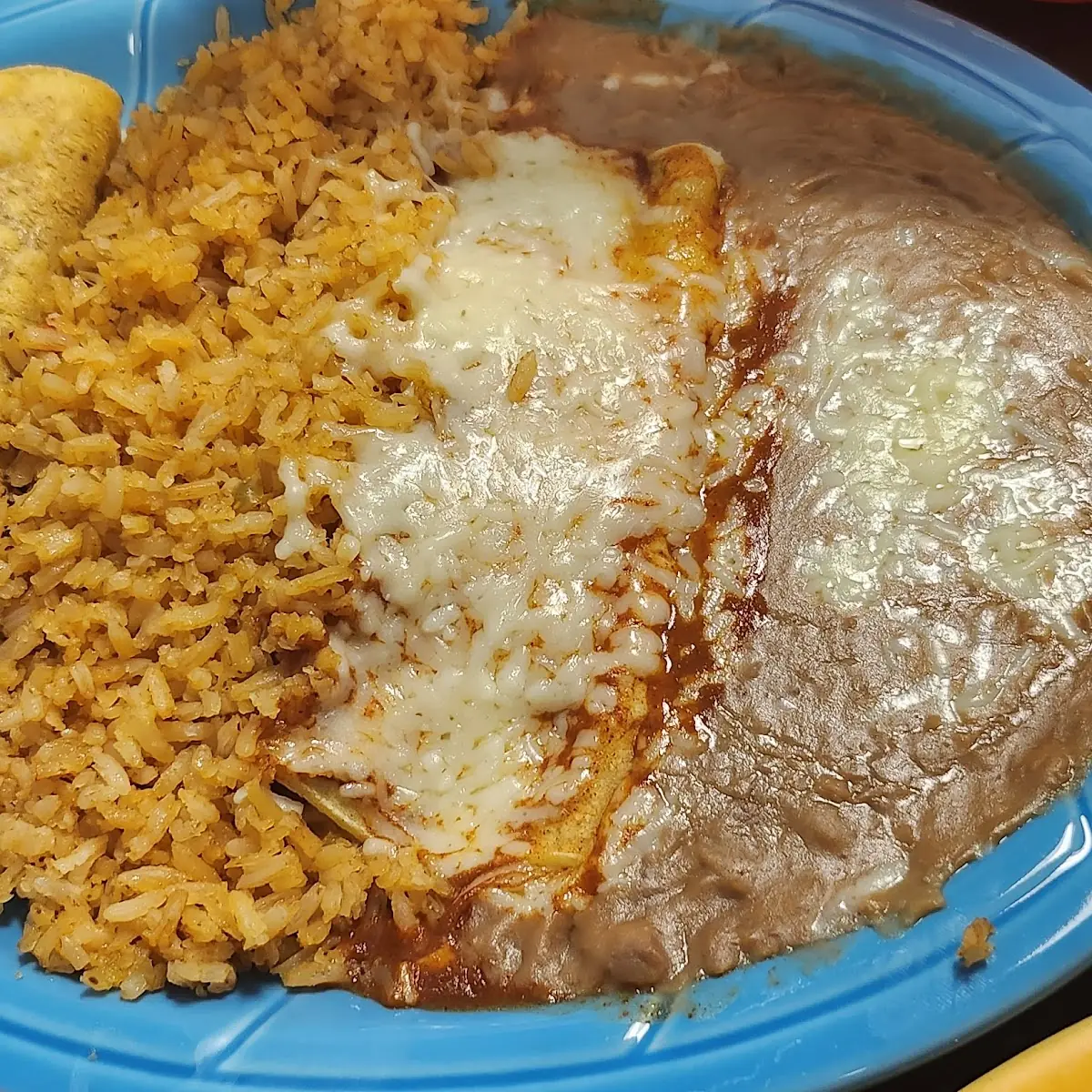 Beef Taco Cheese Enchiladas Rice and Beans