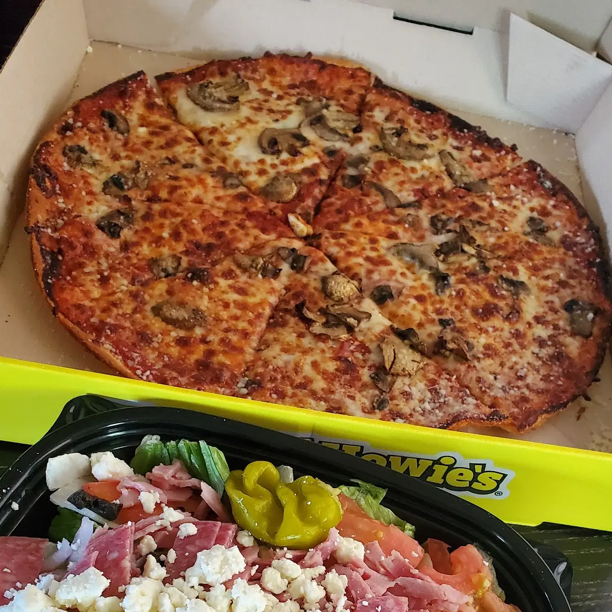 Thin Crust Pizza with Mushrooms