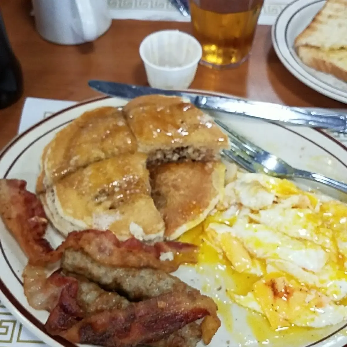 Two Eggs over Easy Bacon and Hash Browns
