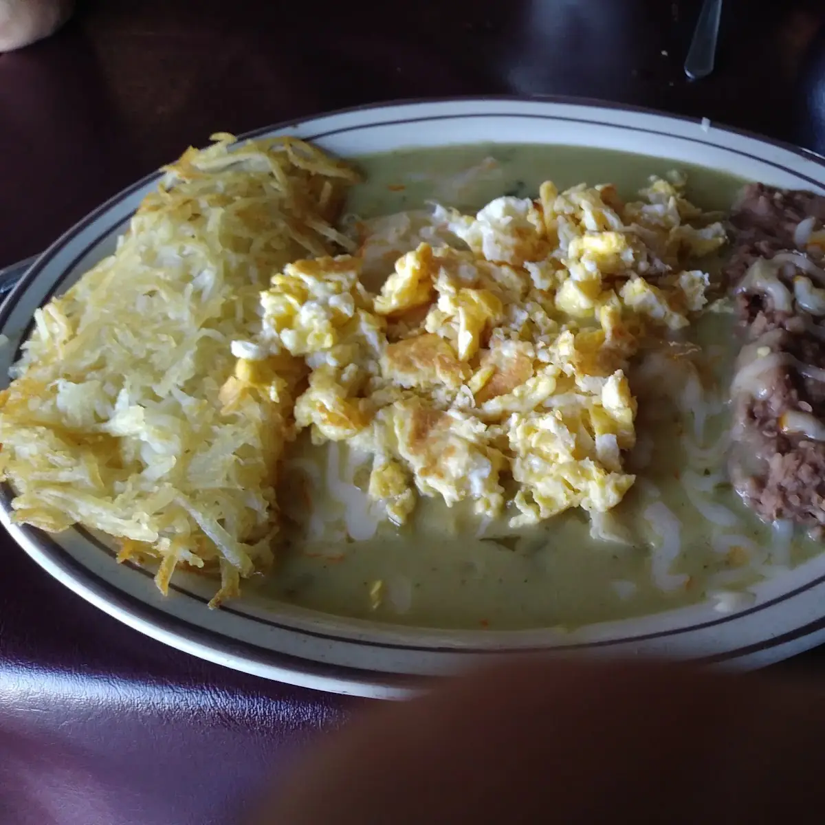 Green Enchiladas Montadas with a Scrambled Egg