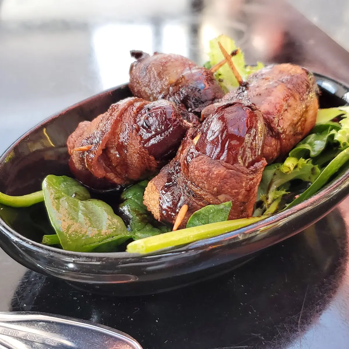 Goat Cheese Stuffed Dates Bacon Wrapped with Balsamic Reduction