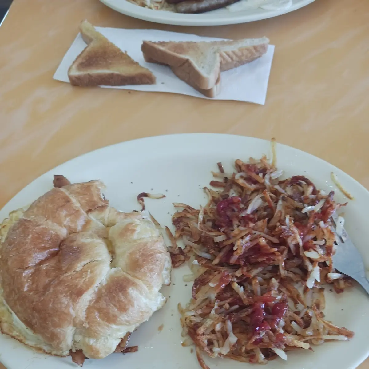 Croissant Sandwich and Hash Browns