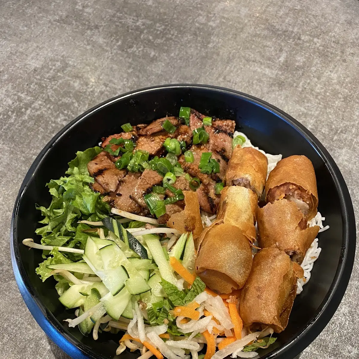 Grilled Pork Vermicelli Bowl with Spring Rolls