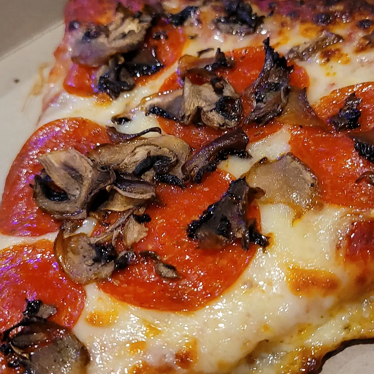 Pepperoni N Mushroom Pizza Slice