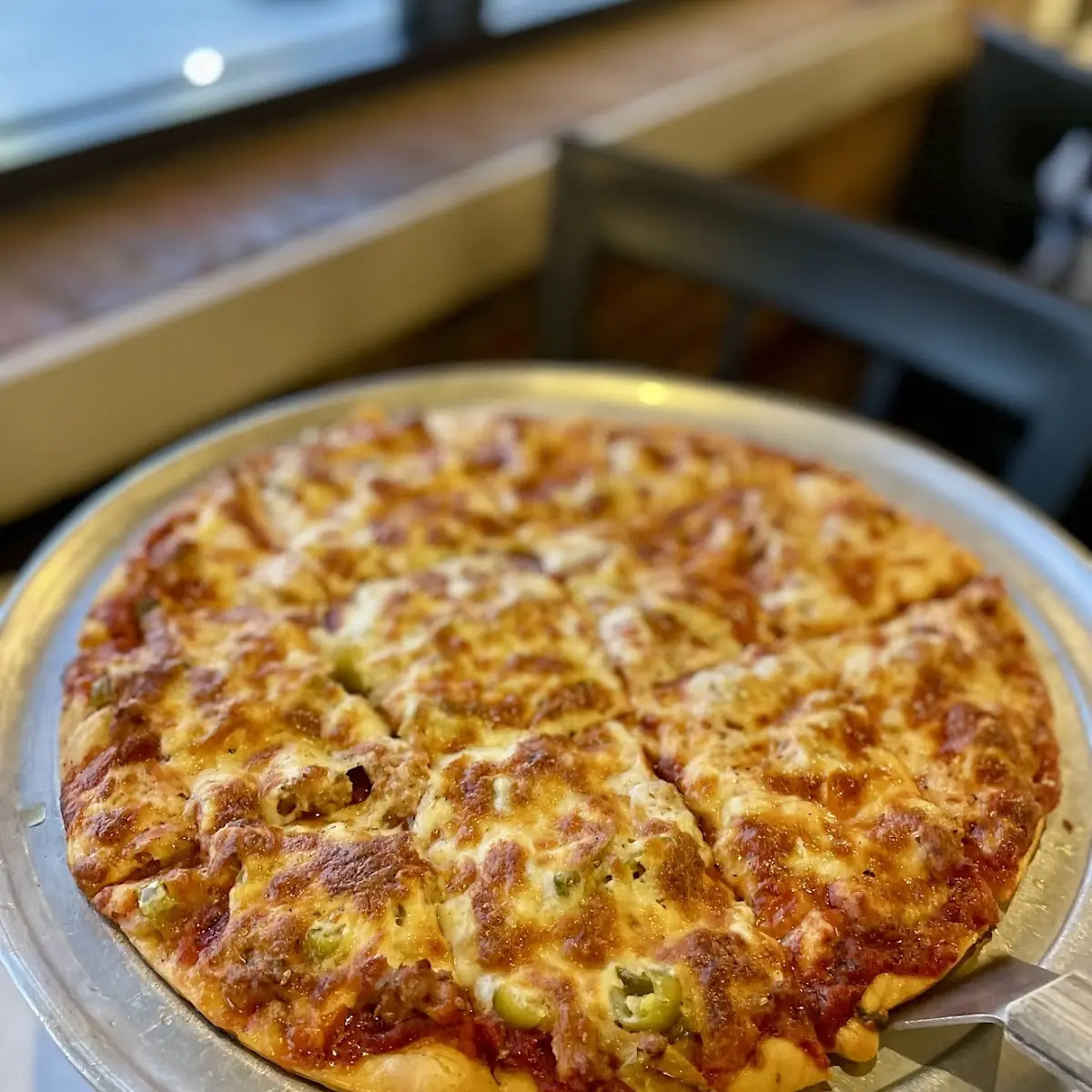 Thin Crust Cheese and Sausage Pizza
