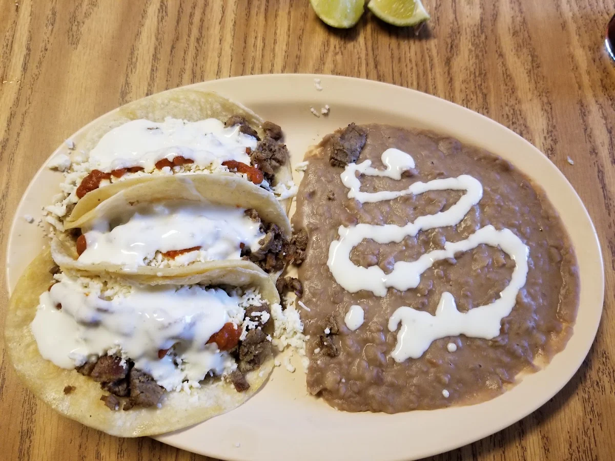 Assorted Tacos Refried Beans and Salsa Picosa Hot