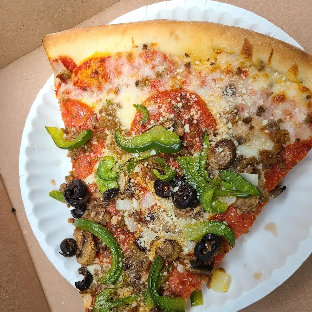 Brooklyn Deluxe Pizza Slice