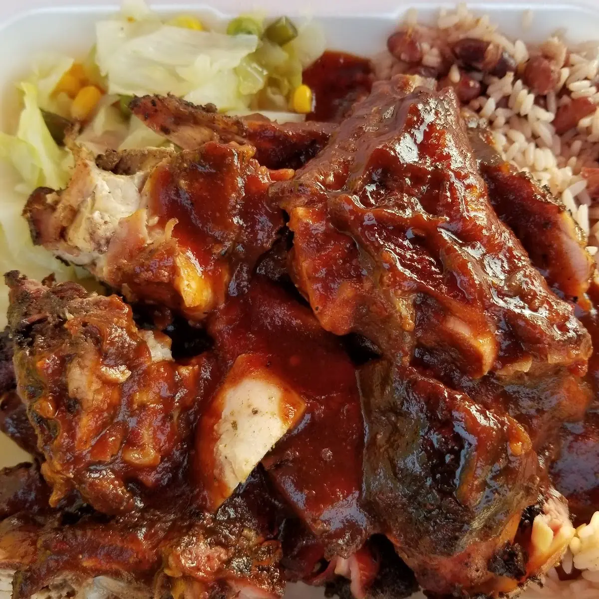 Large Jerk Chicken with Rice & Beans and Some Cabbage