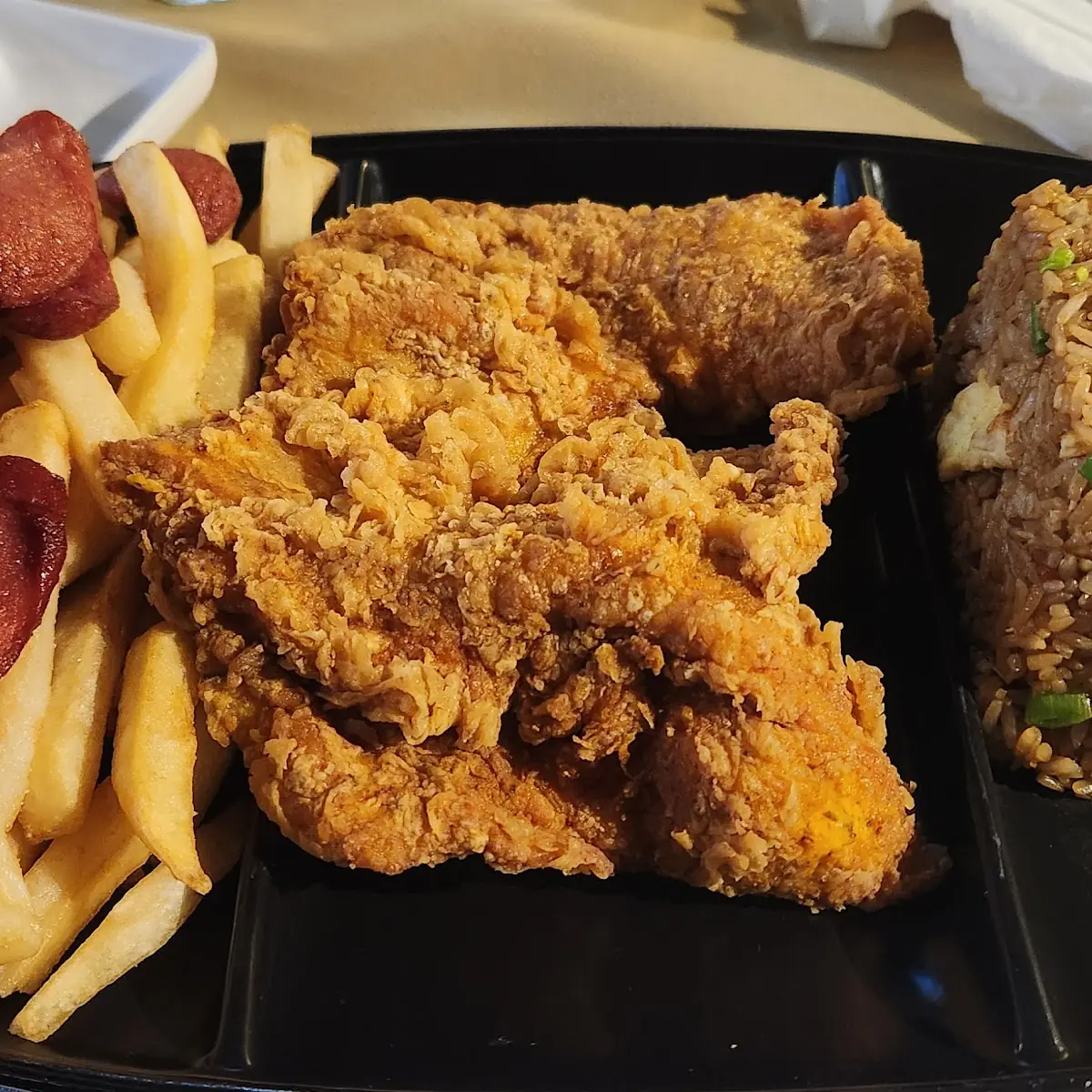 Peruvian Fried Chicken with Fried Rice Fries and Sausages
