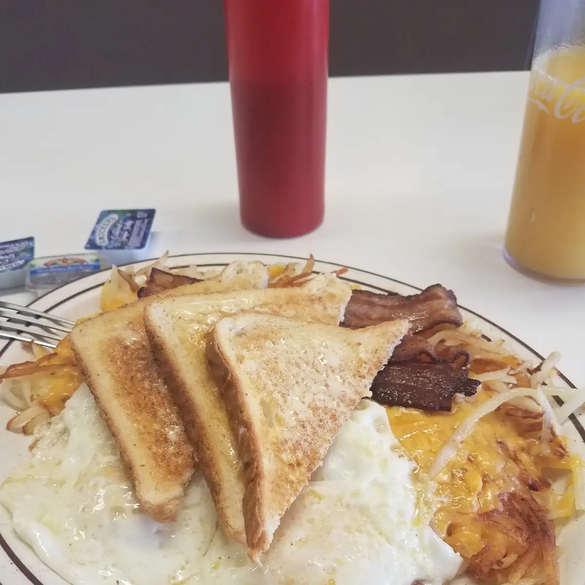 Two Eggs Hash Browns and Toast
