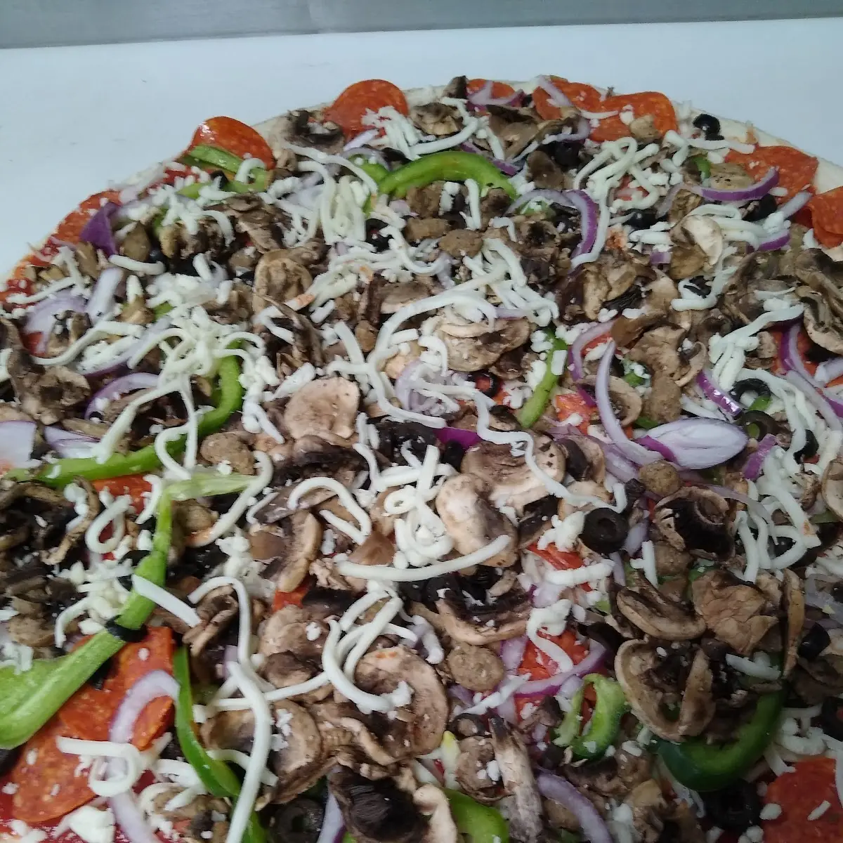 Supreme Pizza Before the Oven