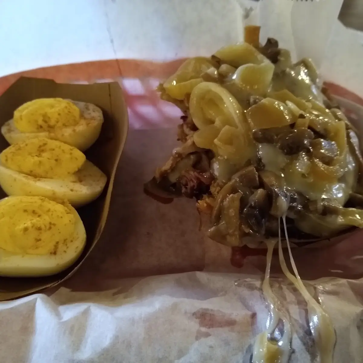 Pulled Pork with Onions Mushrooms and Cheese and Deviled Eggs