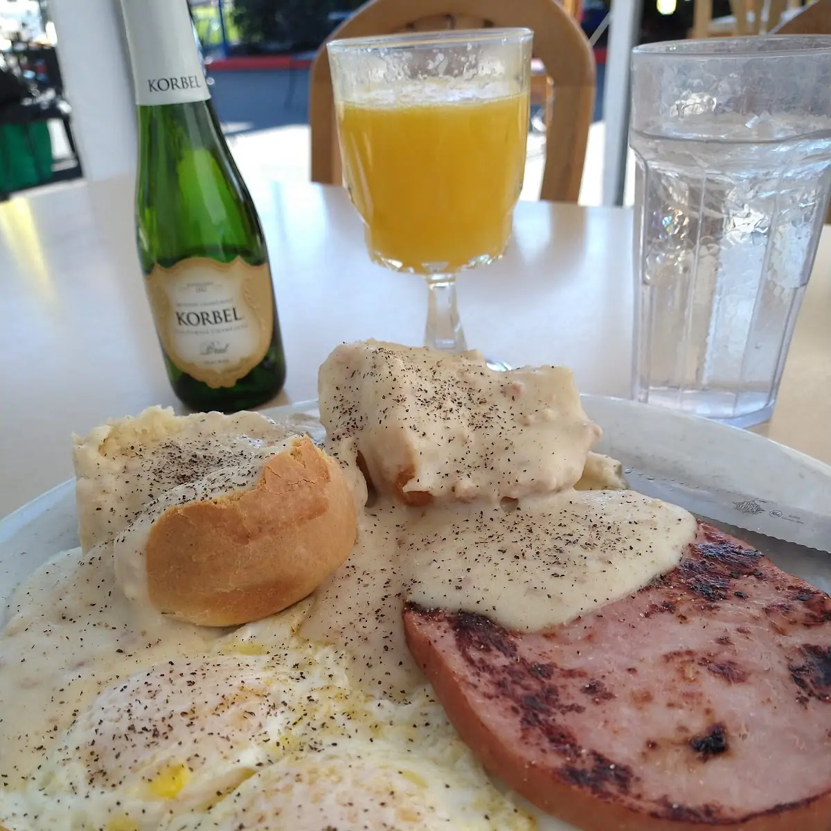 Biscuits and Gravy Eggs over Medium Hash Browns N a Mimosa
