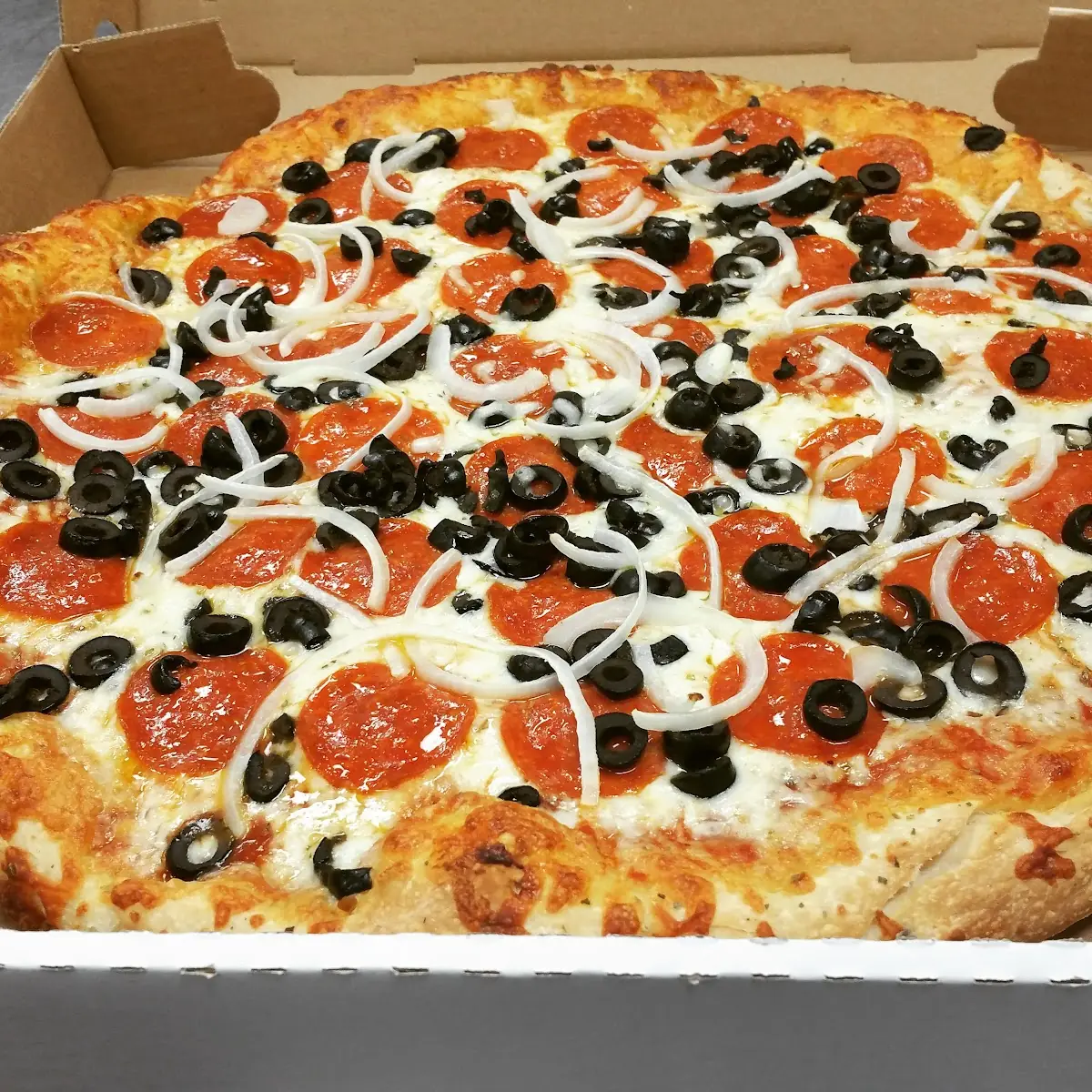 Pepperoni Black Olives and Onions Pizza