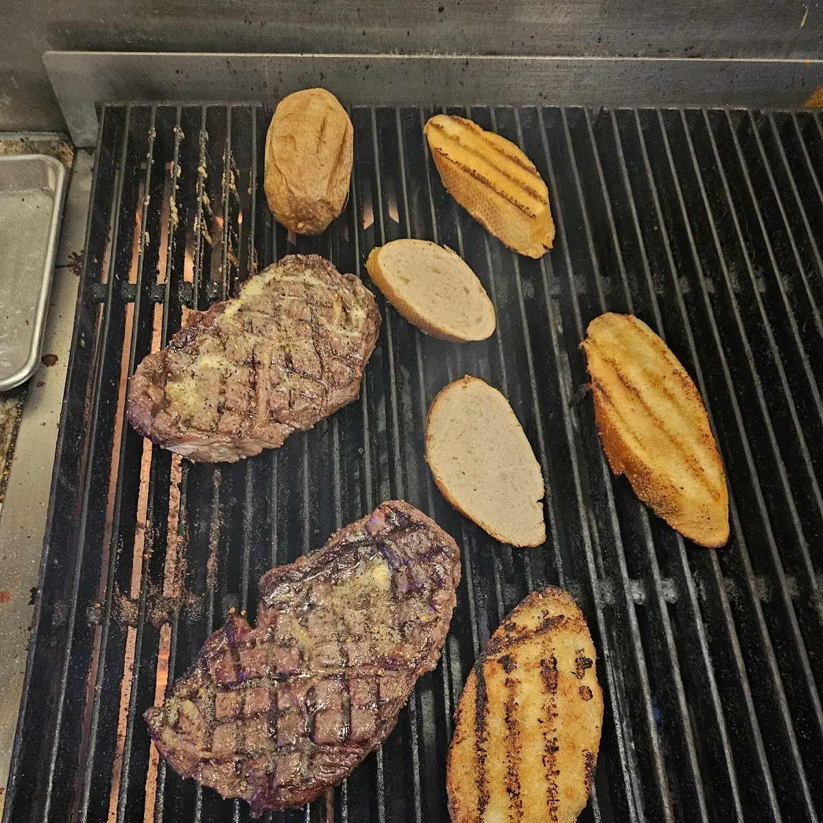 Ribeye Steak and Salad with Garlic Bread