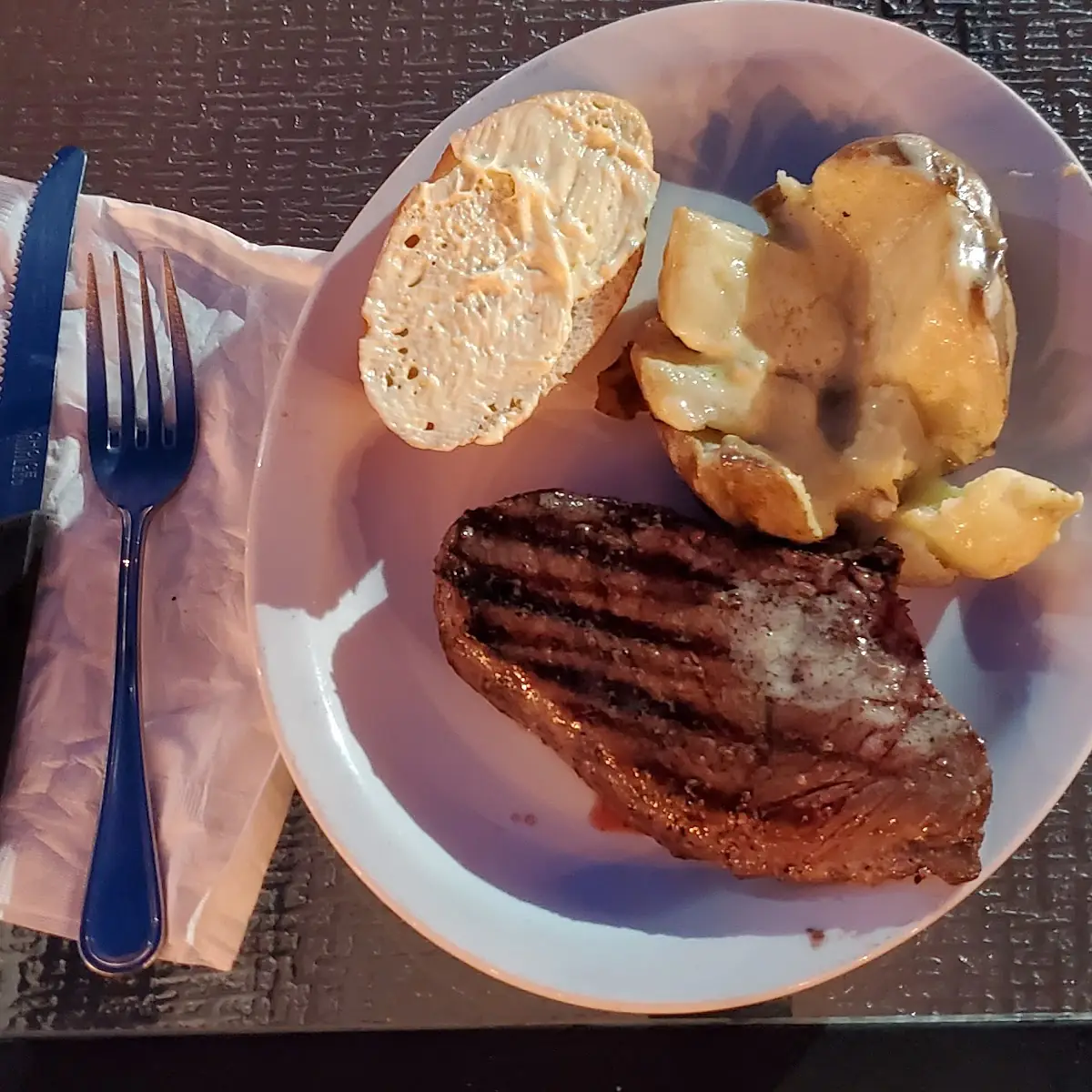 Steak Baked Potato and Bread