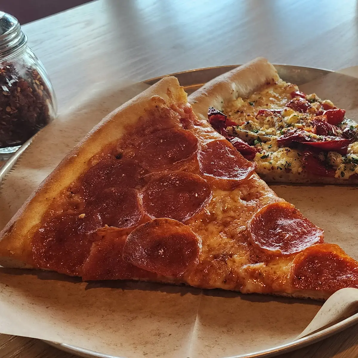 Extra Pepperoni Pizza and Spicy Chicken Pizza