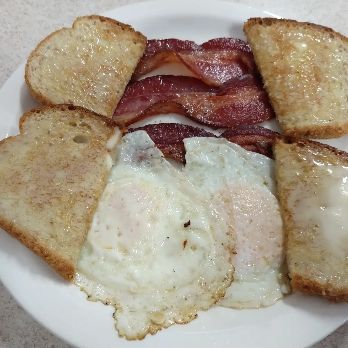 Bacon and over Easy Eggs