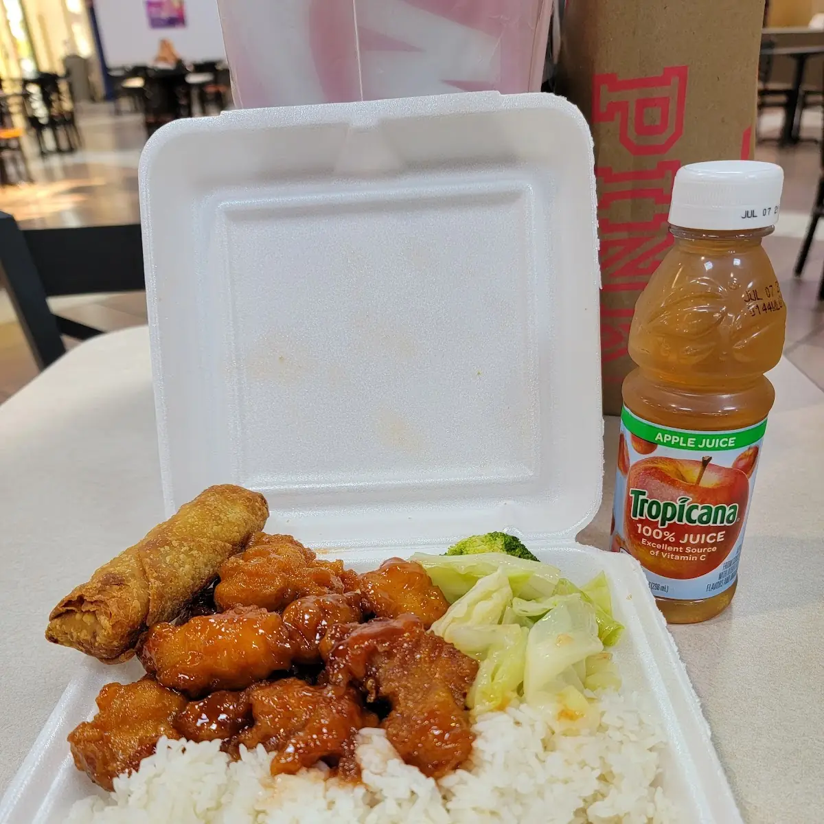 Sesame Chicken and White Rice and Egg Roll