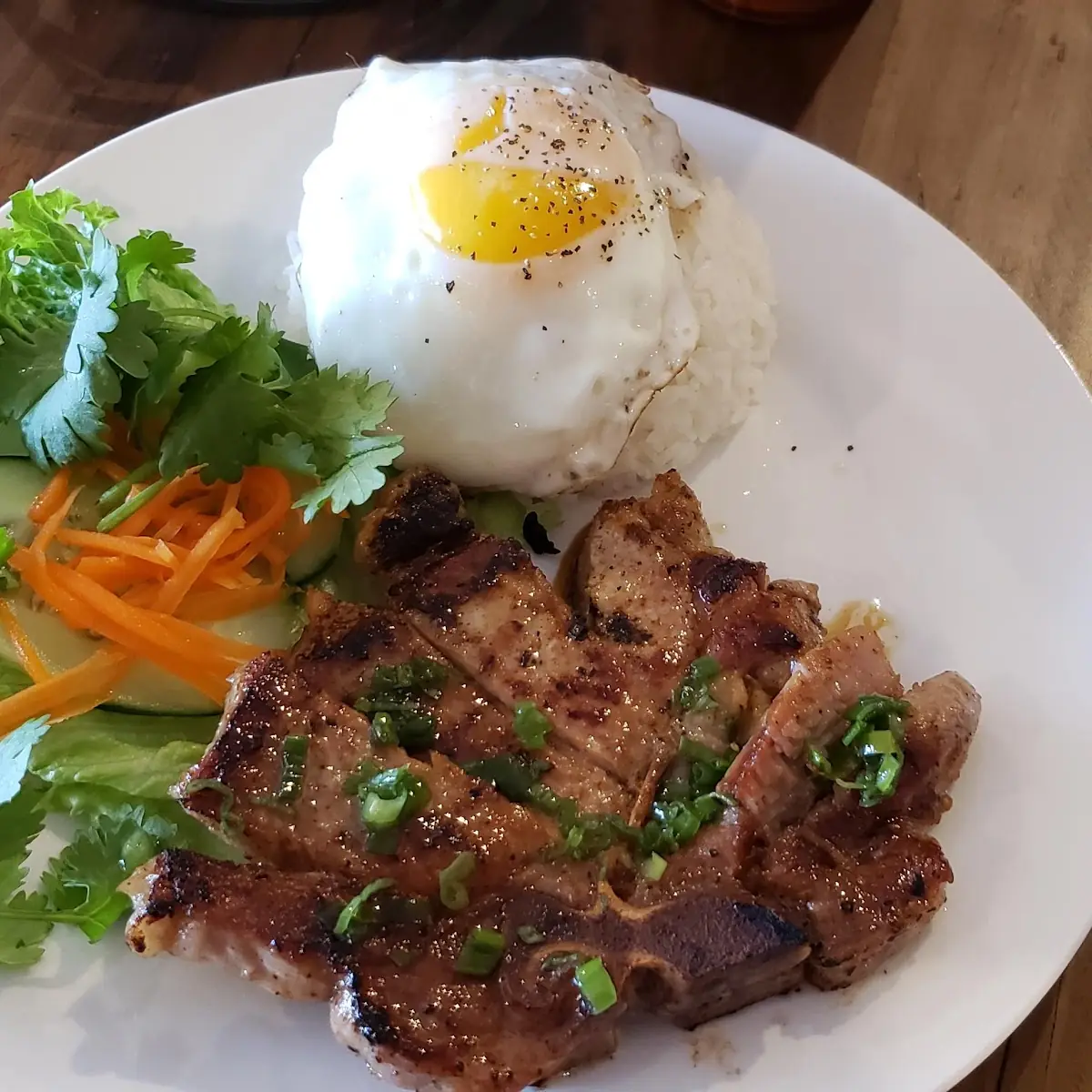 Com Suon Nuong Porkchop Served with Rice and Egg