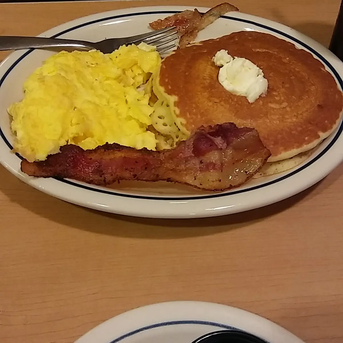 Scrambled Eggs Bacon and Pancakes