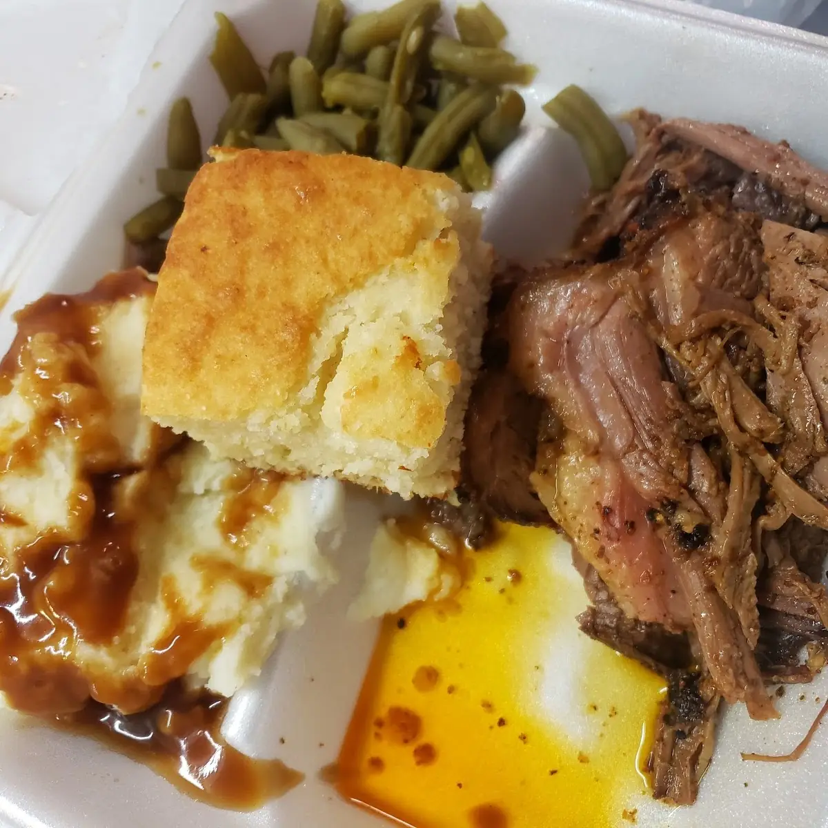 Beef Brisket Plate Green Beans Mashed Potatoes and Gravy