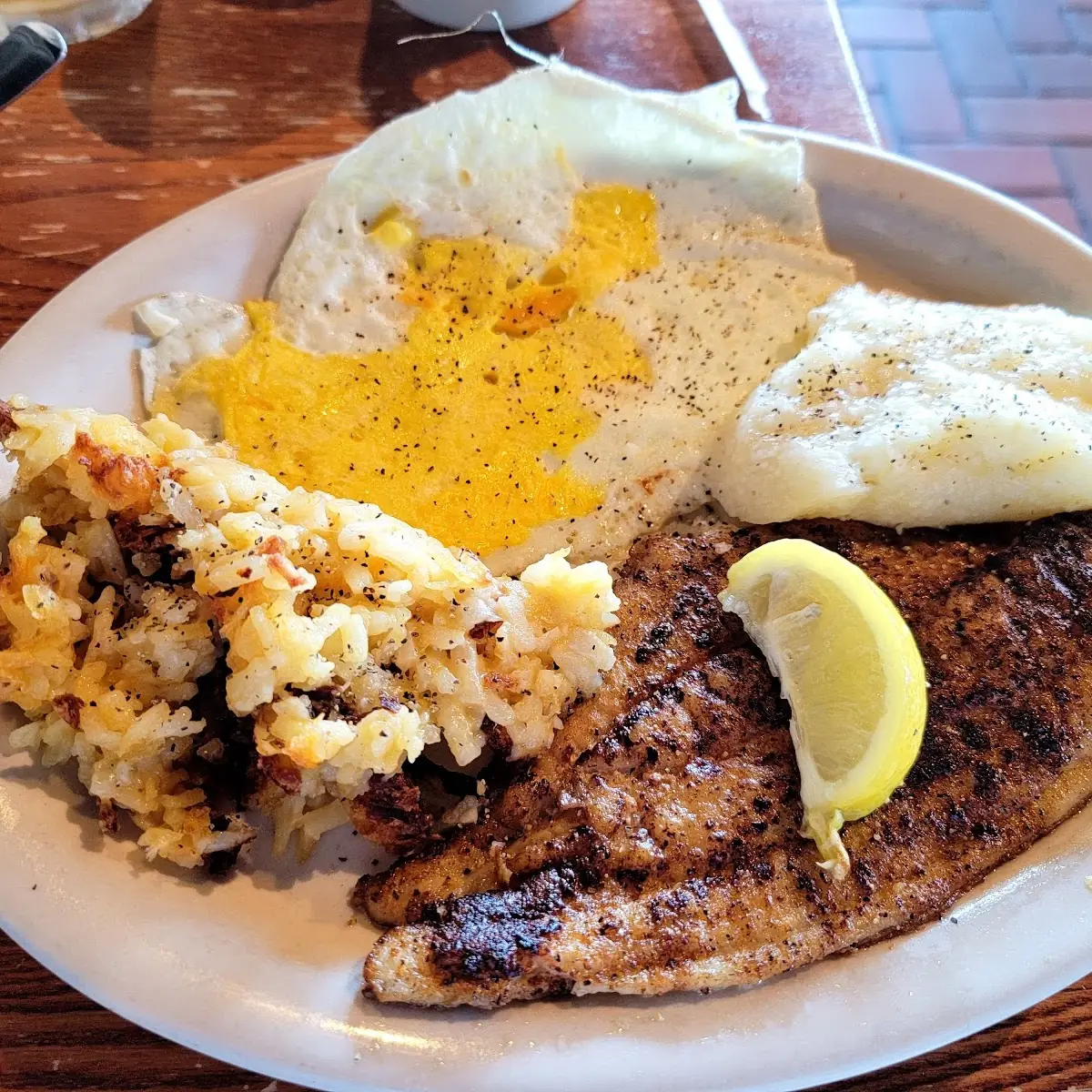 Catfish Eggs Brown Rice Grits Biscuits and Gravy