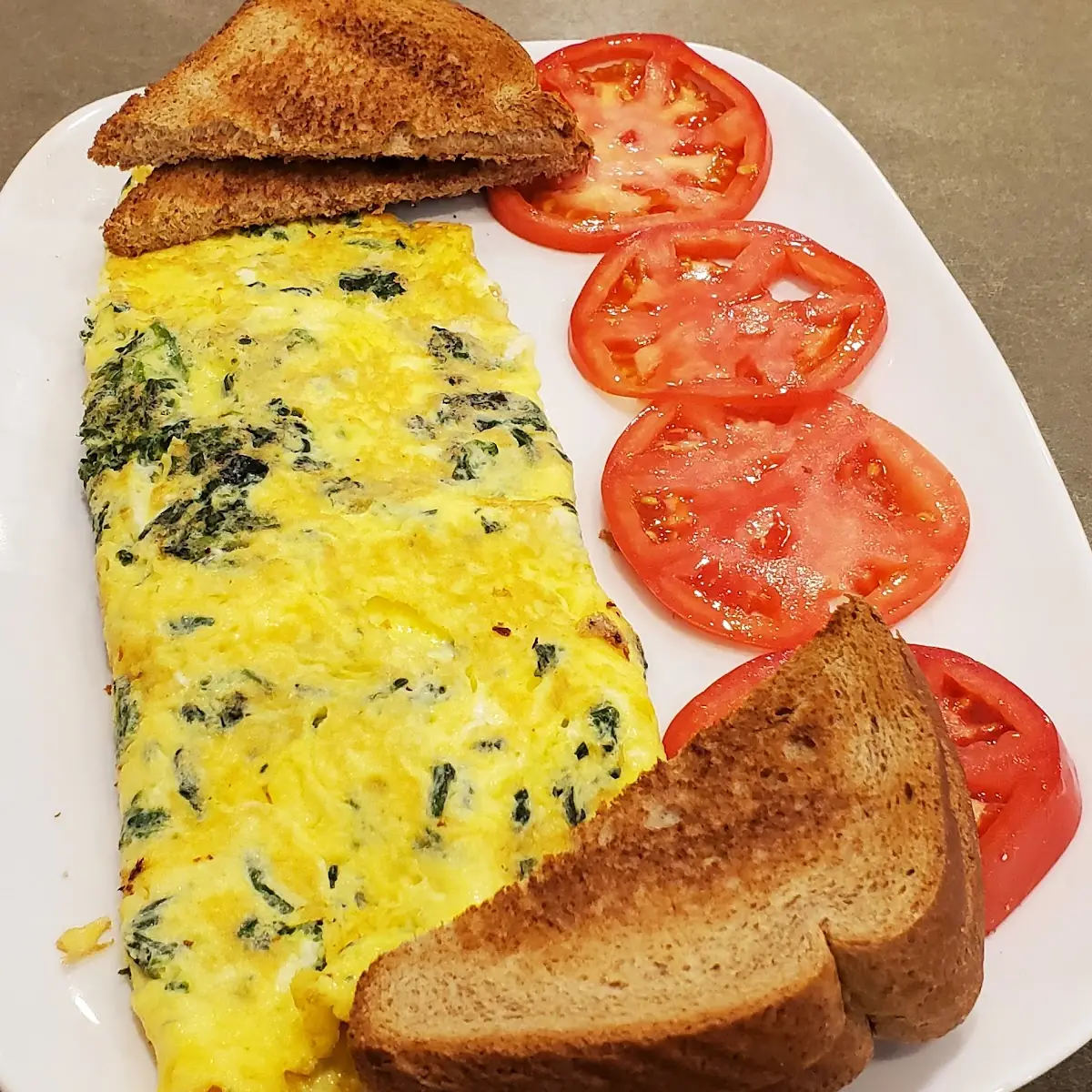 Spinach Omelette with Tomato Slices