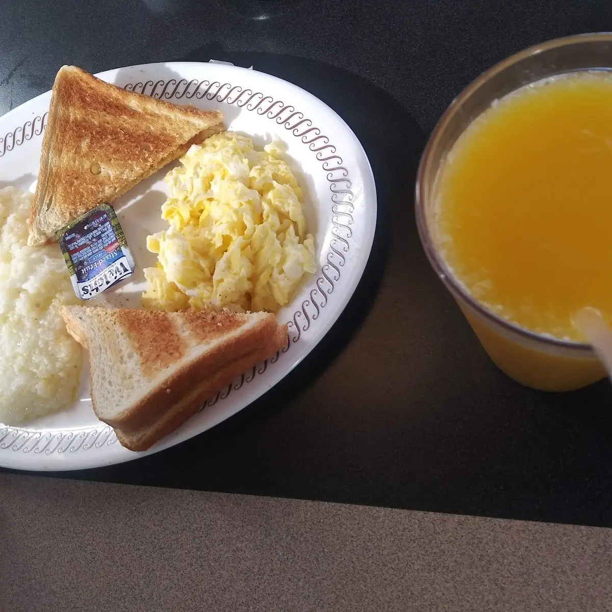 Grits and Scrambled Eggs with Orange Juice