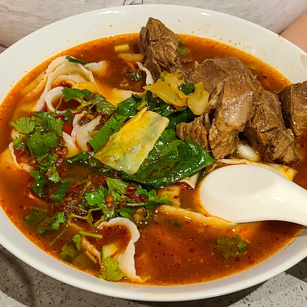 Spicy Beef Noodle Soup with Rice Noodles