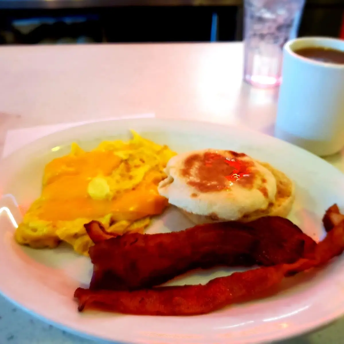 Scrambled Eggs Bacon English Muffin