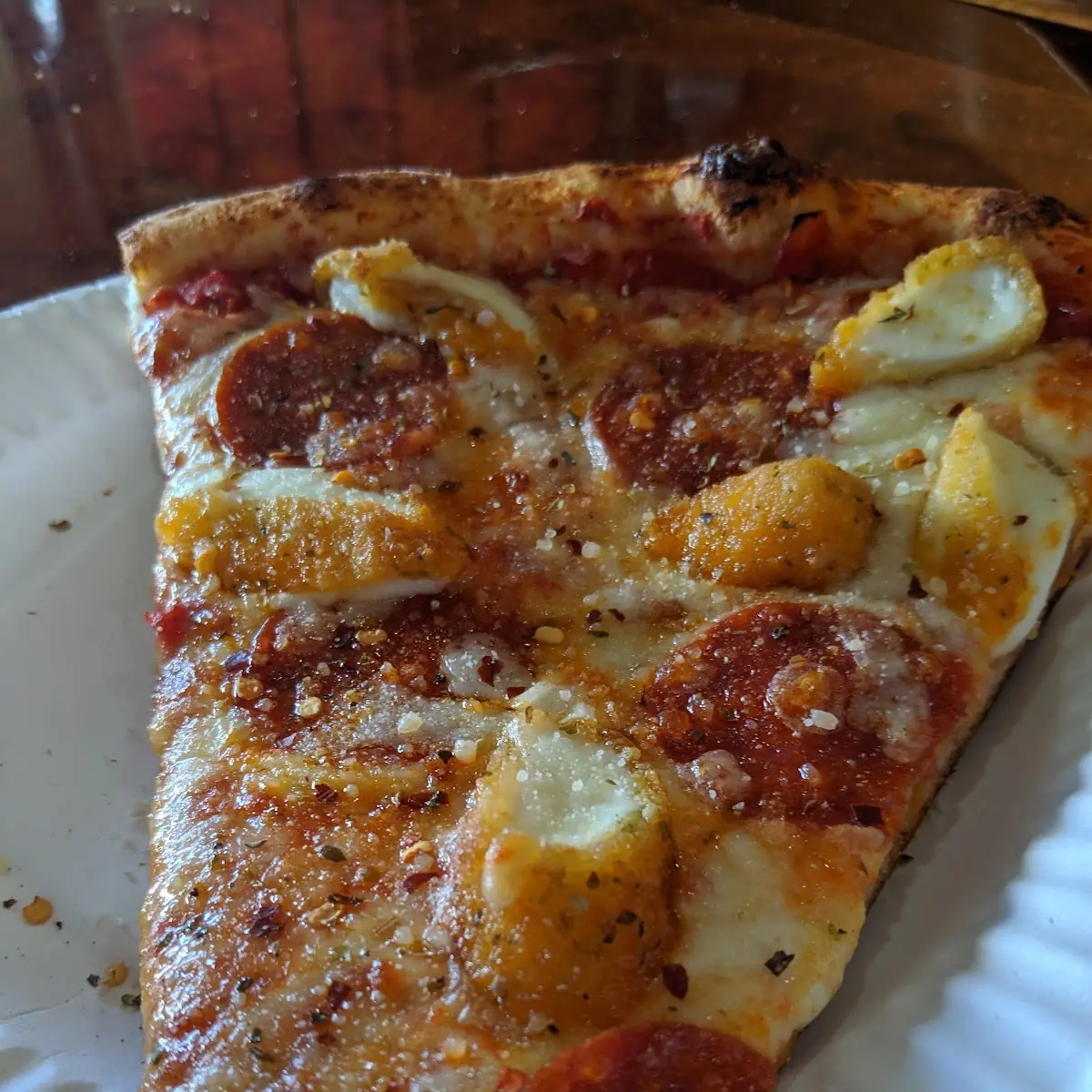 Pepperoni and Mozzarella Stick Slice of Pizza