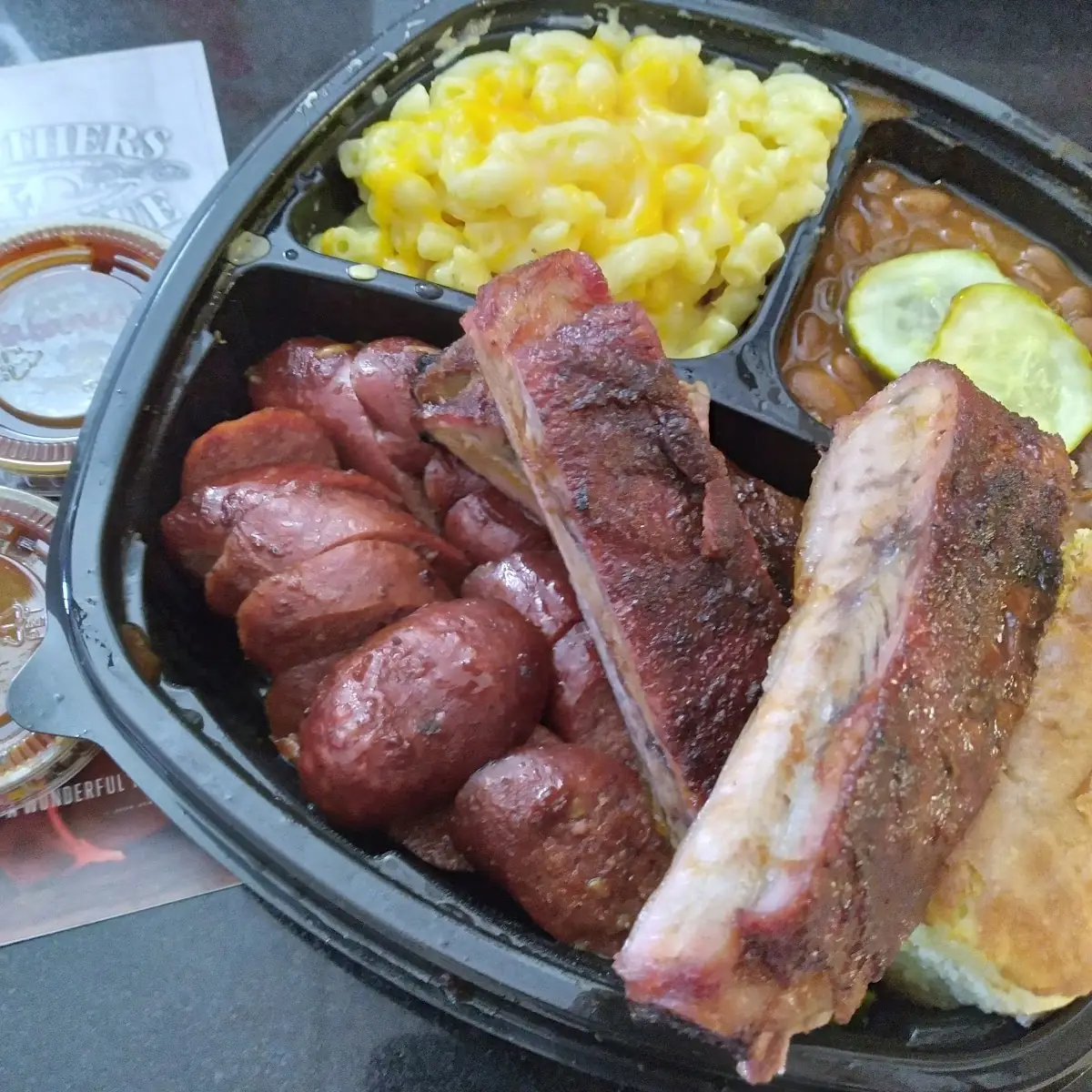 BBQ Ribs Baked Beans Mac & Cheese Sausage and Corn Bread