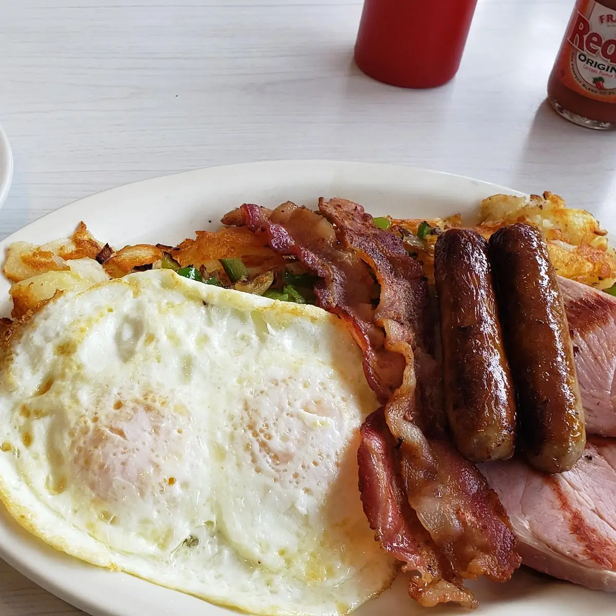 Breakfast with Hash Browns Eggs and Bacon Egg