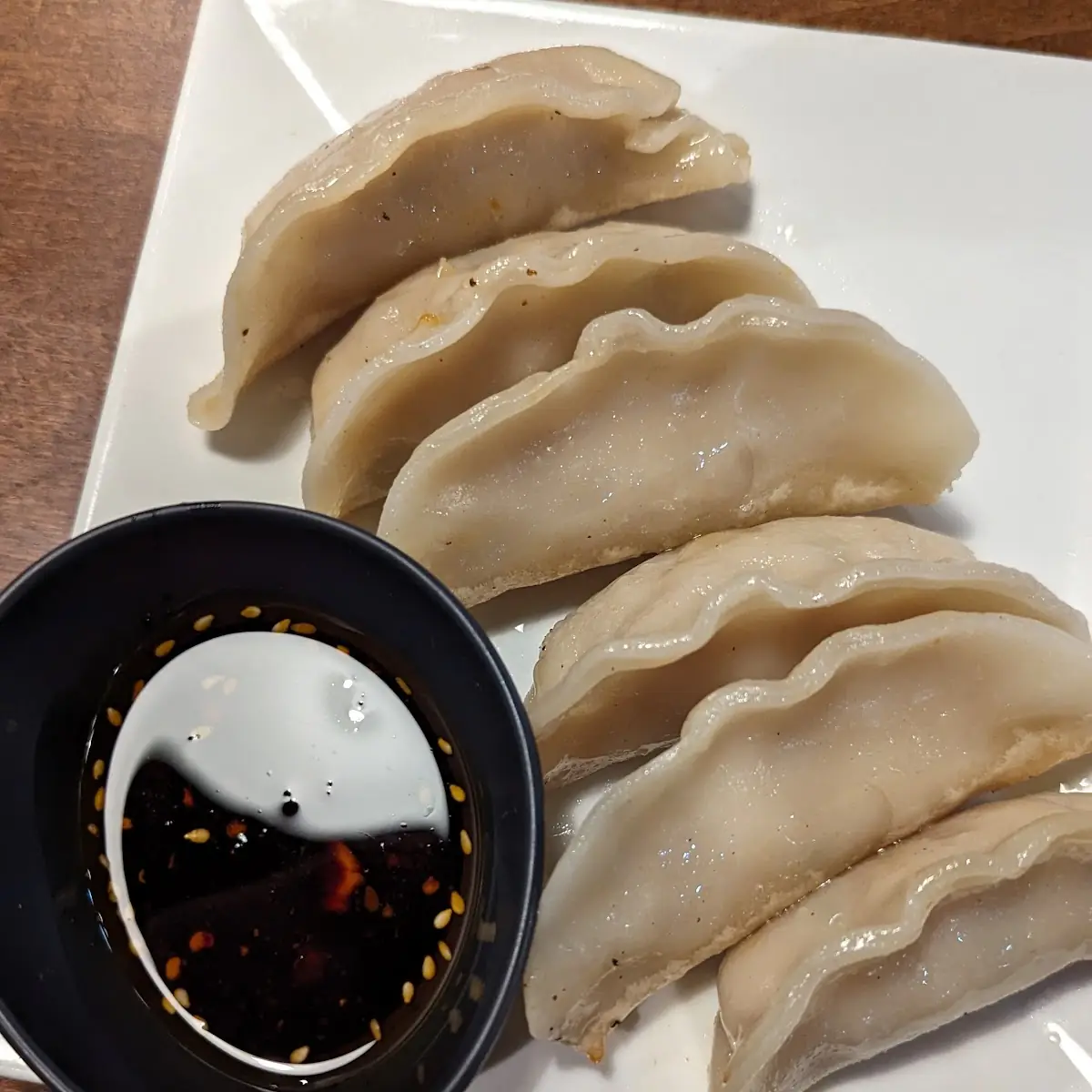 Pan Fried Dumplings with Chili Sauce