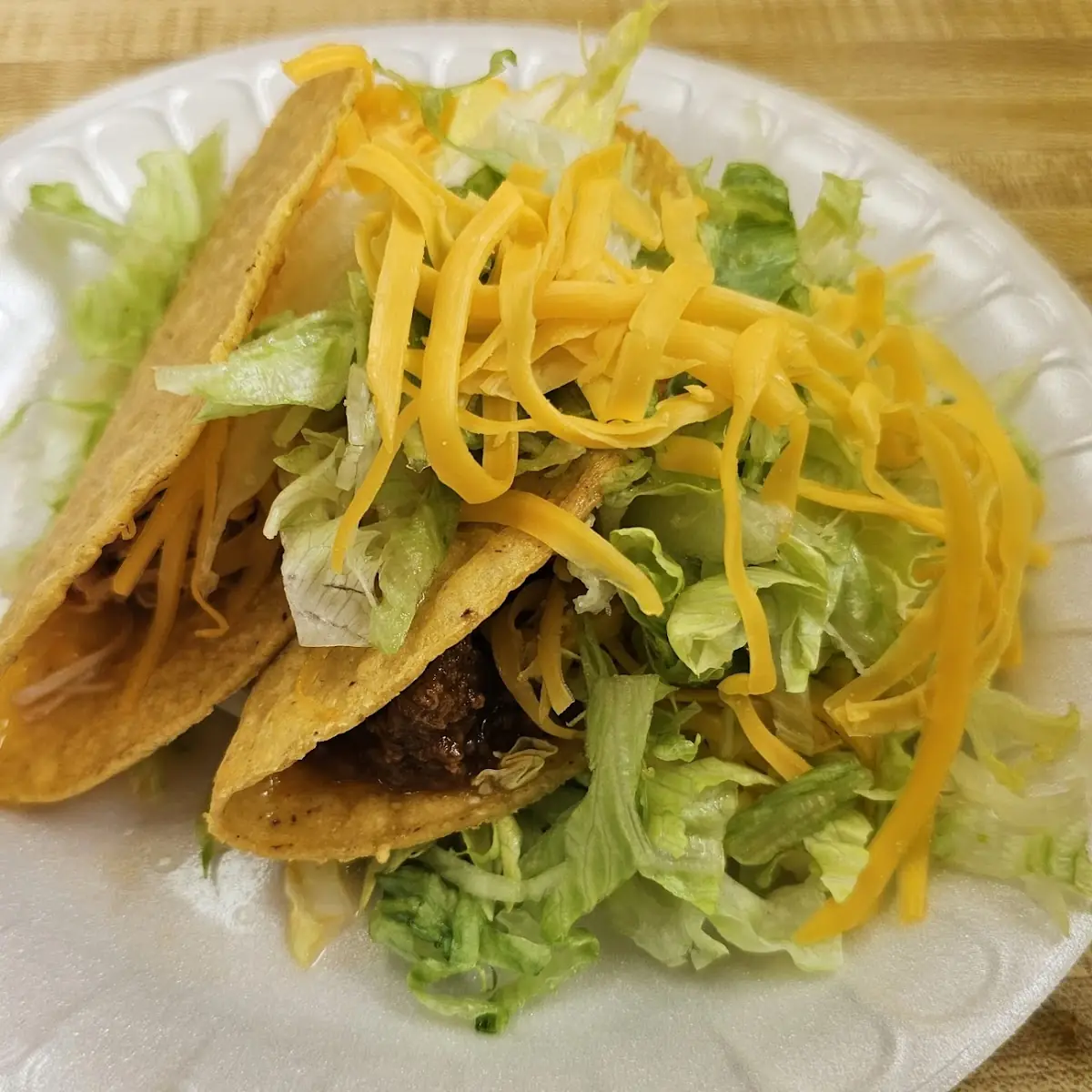 Bean Tostada Beef Taco and 2 Rolled Tacos