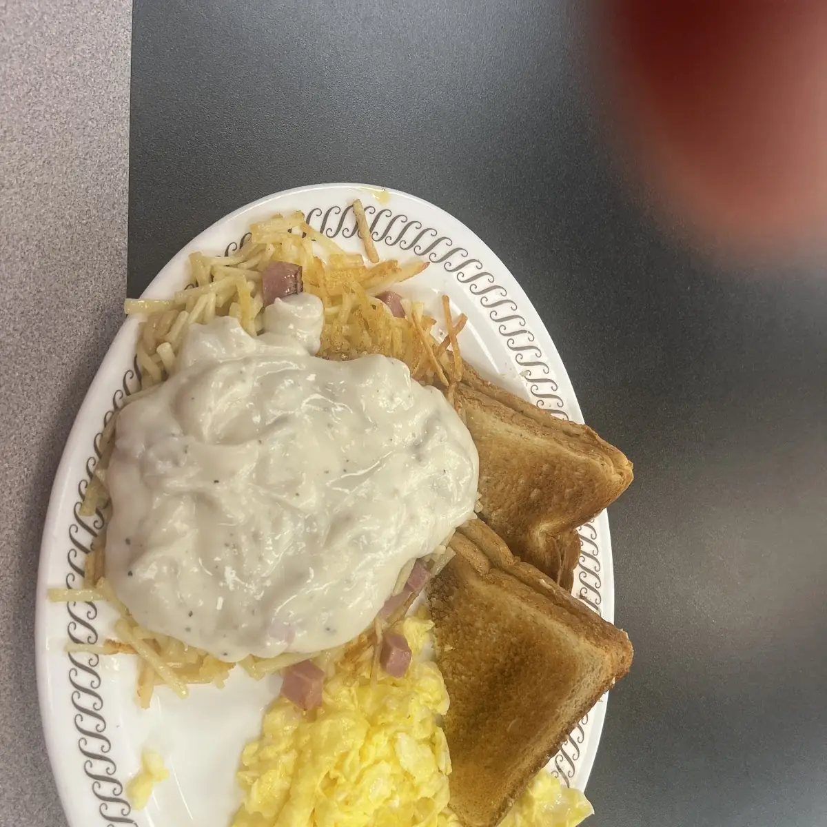 Two Biscuits & Gravy Two Eggs on the Side & Beverage