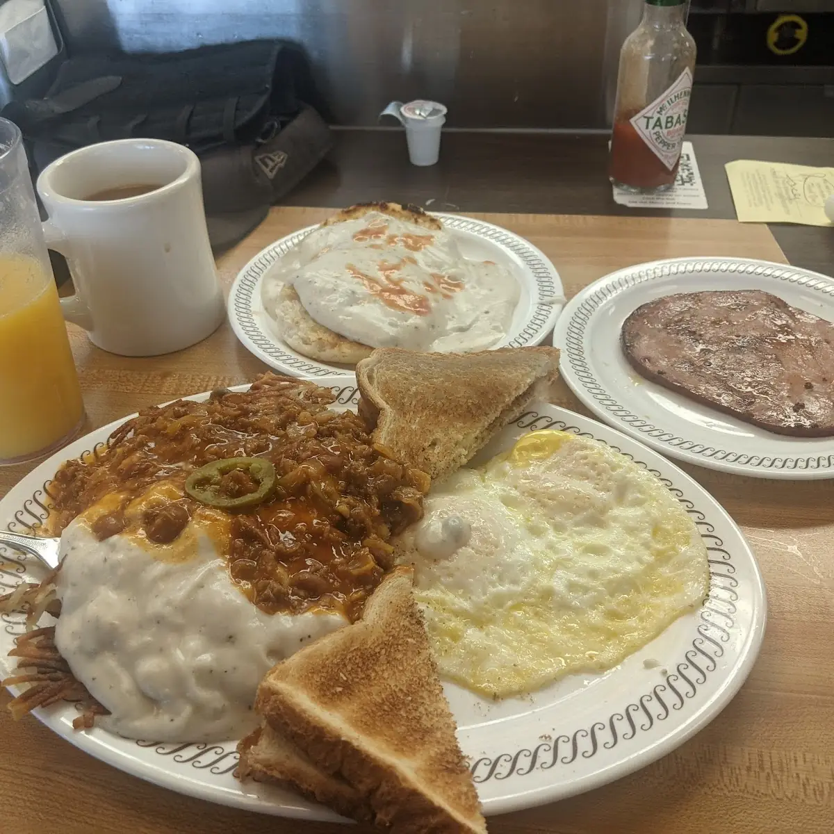 Two Biscuits & Gravy Two Eggs on the Side & Beverage