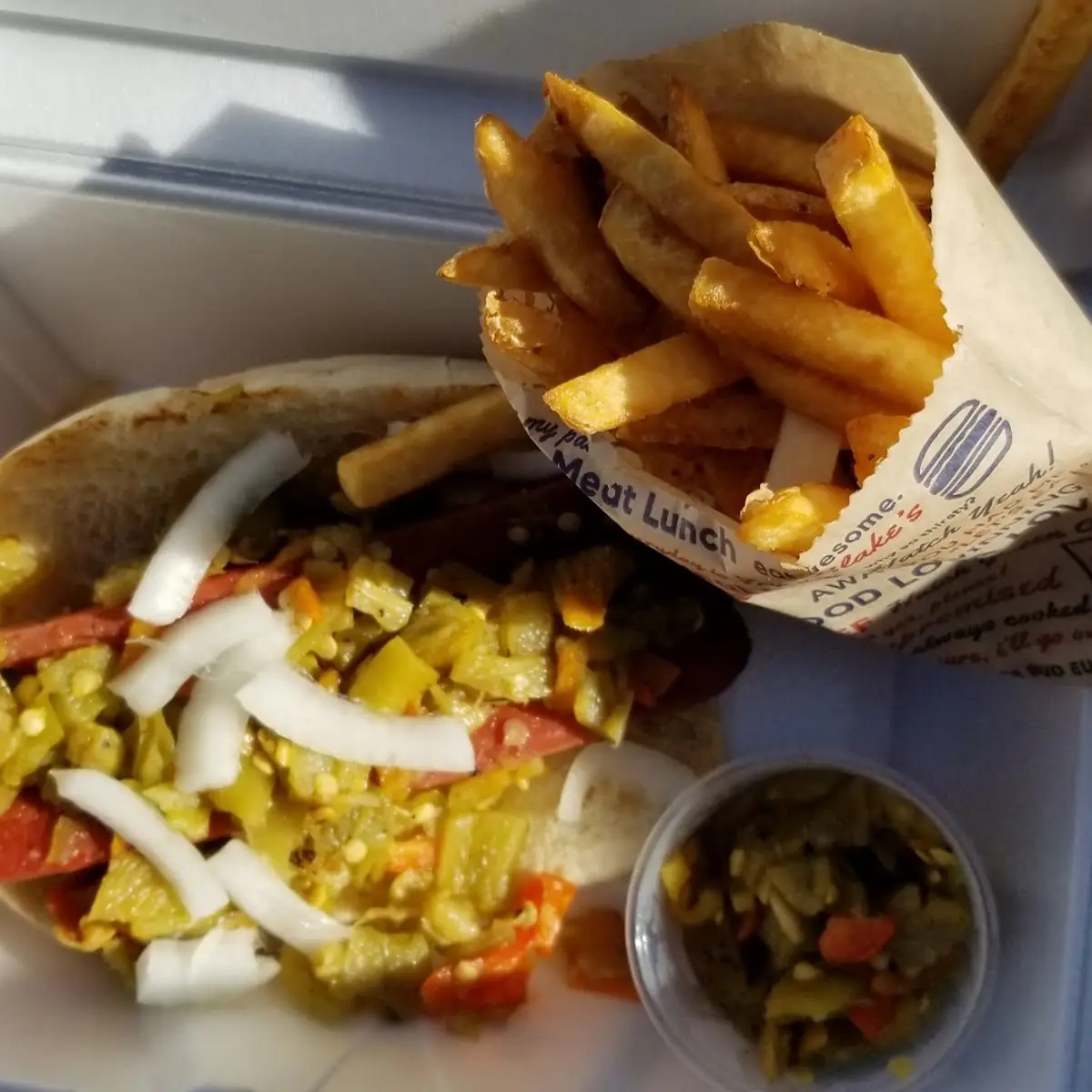 Hot Dog Split Lengthwise and Grilled Smothered with Hatch Chile
