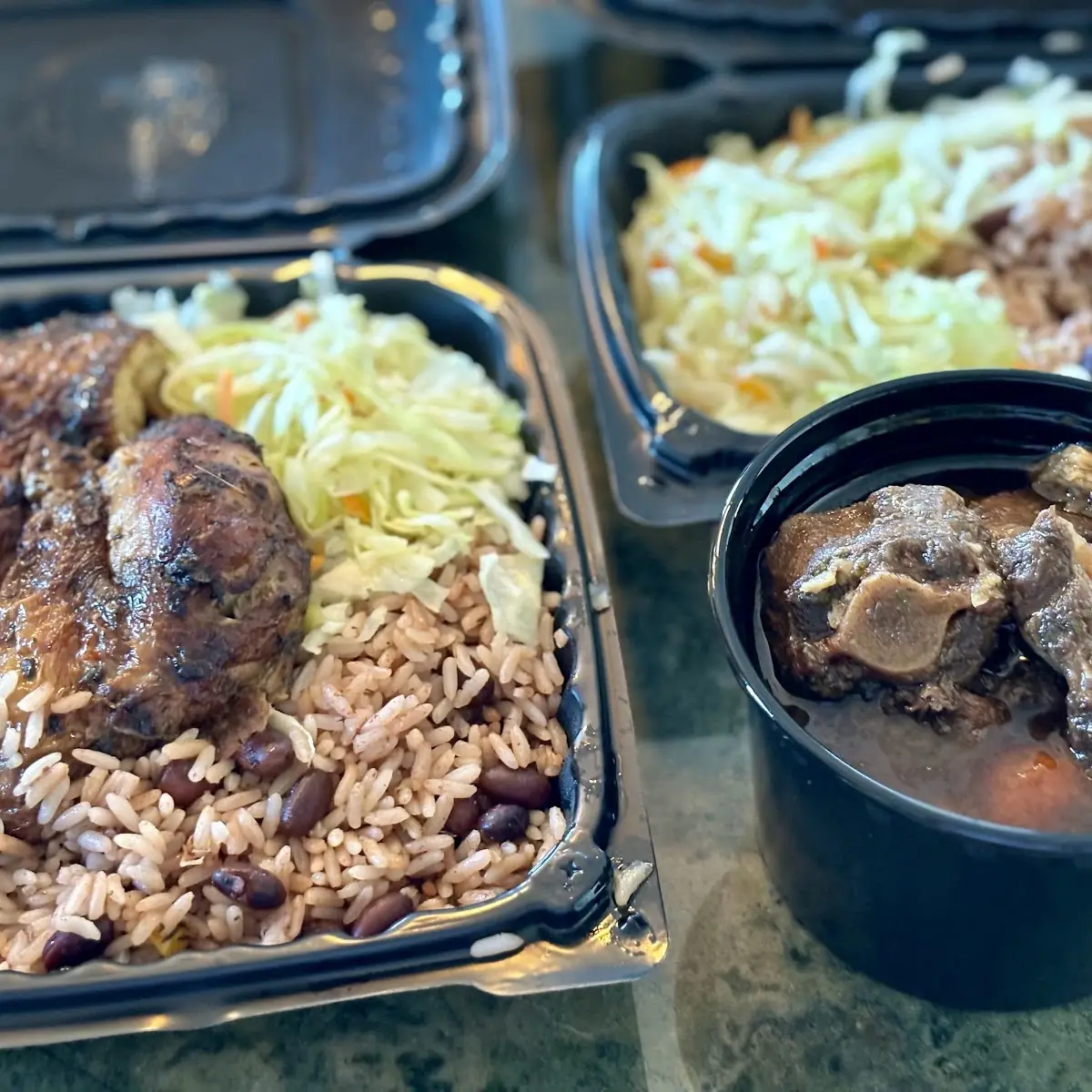Jerk Chicken and Oxtail Dinner