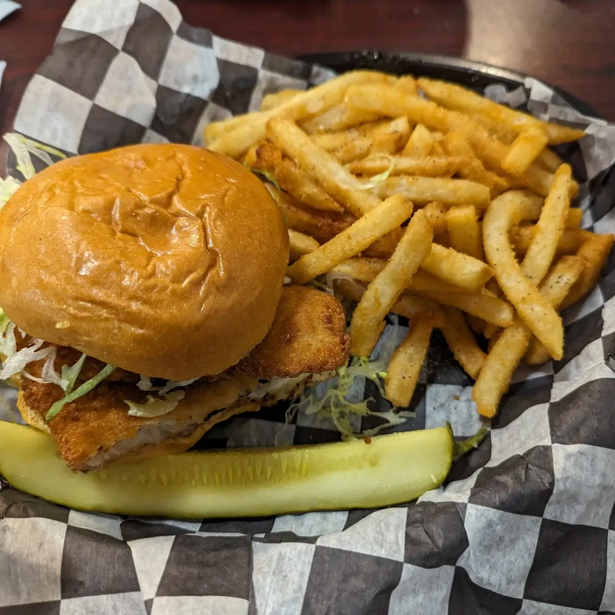 Fish Sandwich with Lettuce and Tomato and Fries