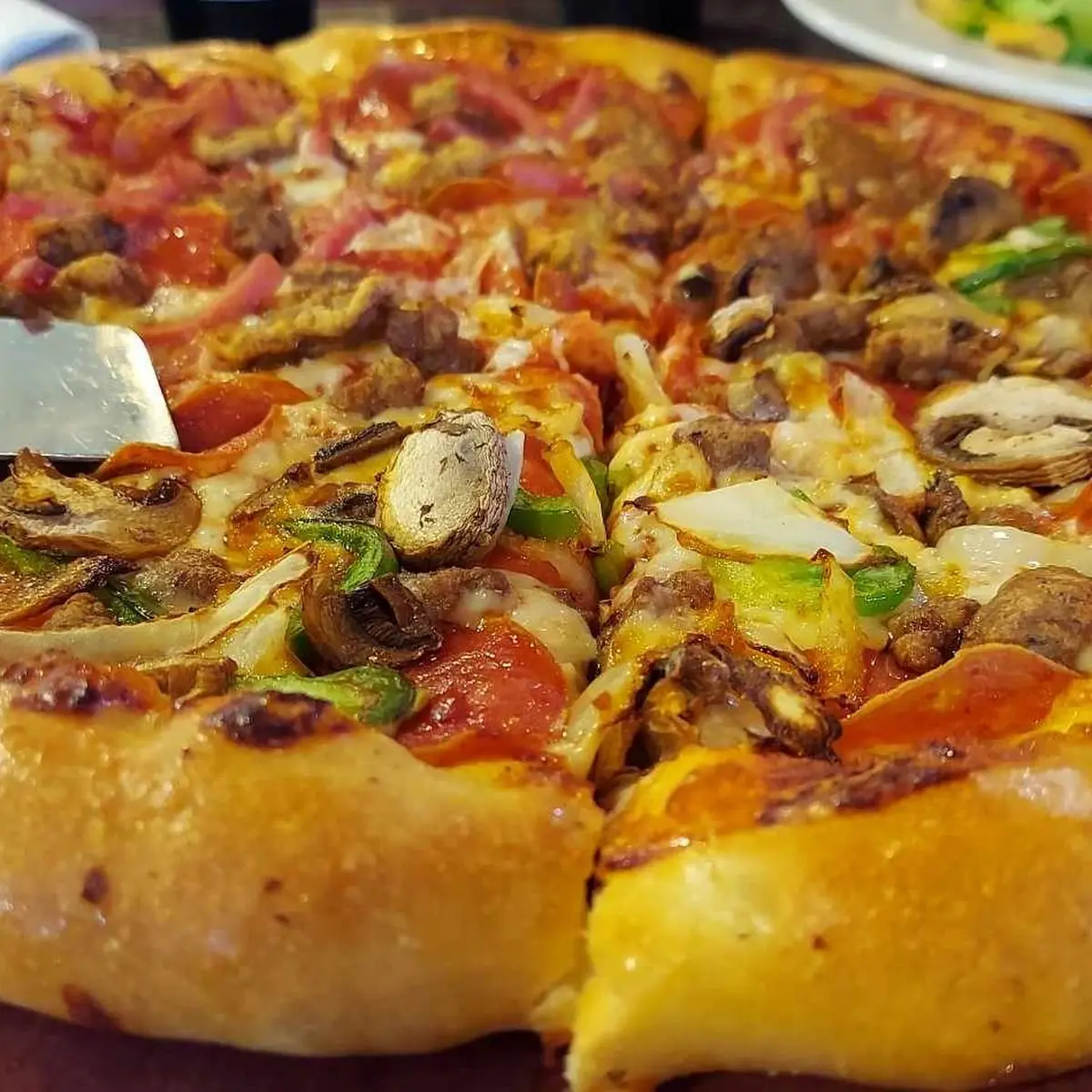 Stuffed Crust Half Meat Lovers Half Supreme Pizza