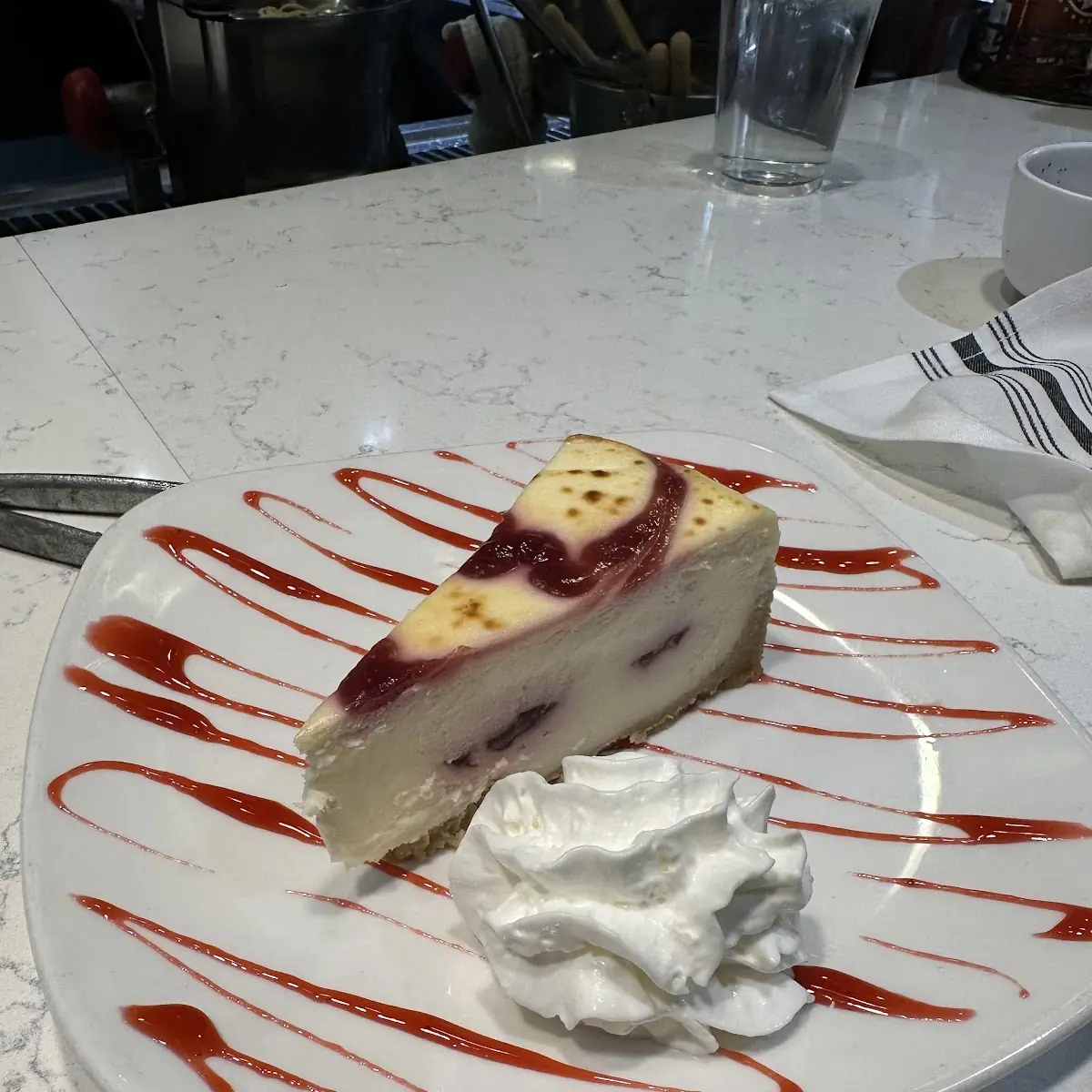 Raspberry White Chocolate Brulée Cheesecake